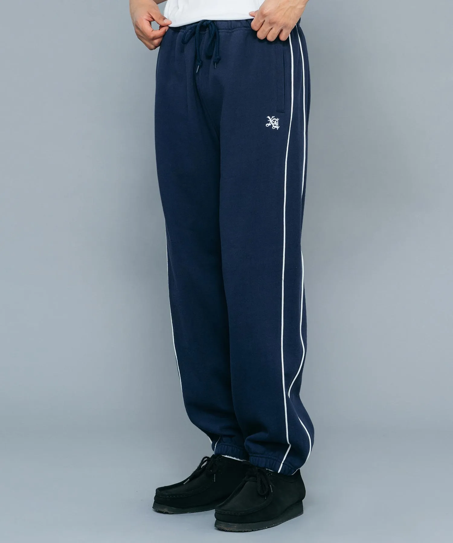 EMBROIDERED LOGO PIPING SWEAT PANTS